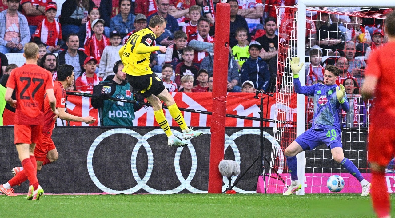 球队防守端发威削弱对手攻势保持不败 球队防守端发威削弱对手攻势保持不败